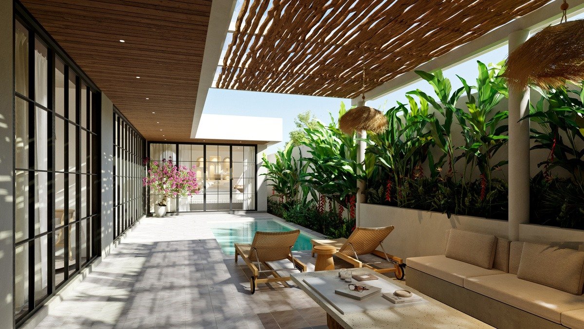 Covered villa terrace under a rattan-screened pergola, with lounge seating beside the pool and tropical planting