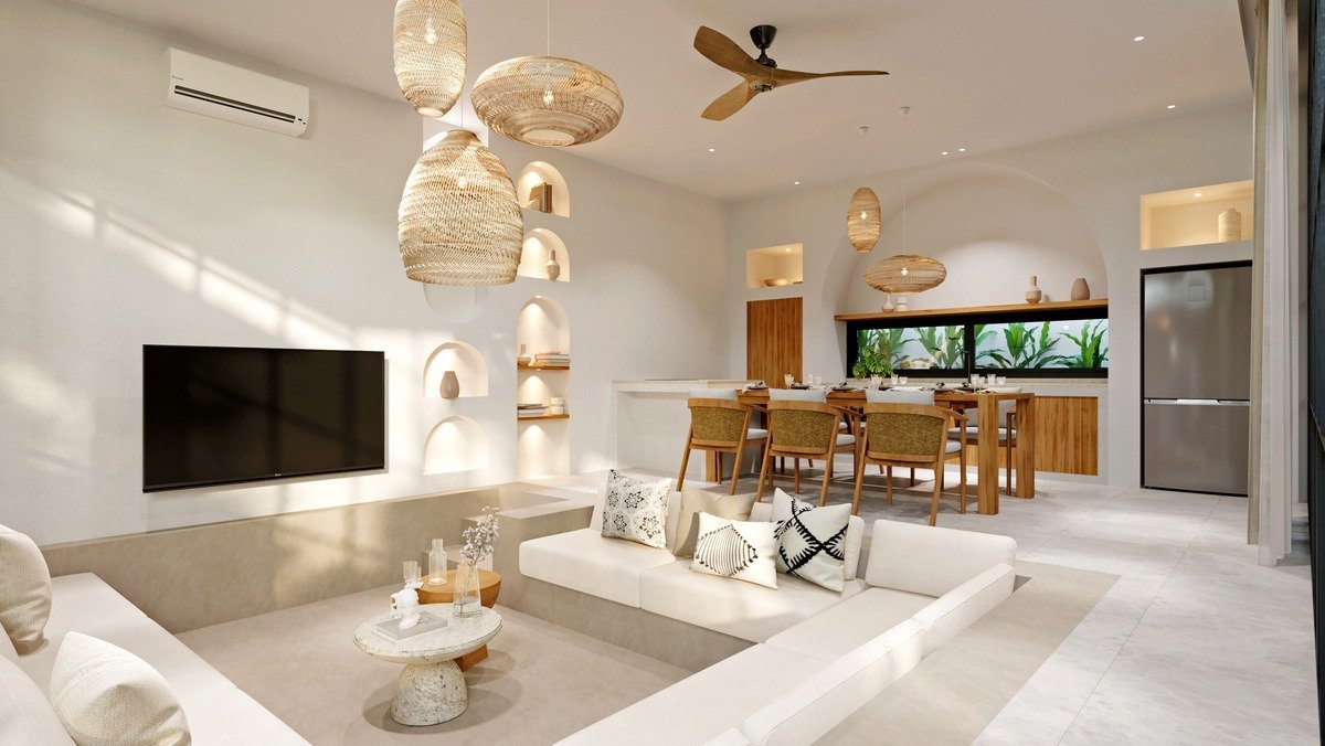 Villa living and dining interior — sunken white lounge, arched wall niches, woven pendant lights and timber dining table