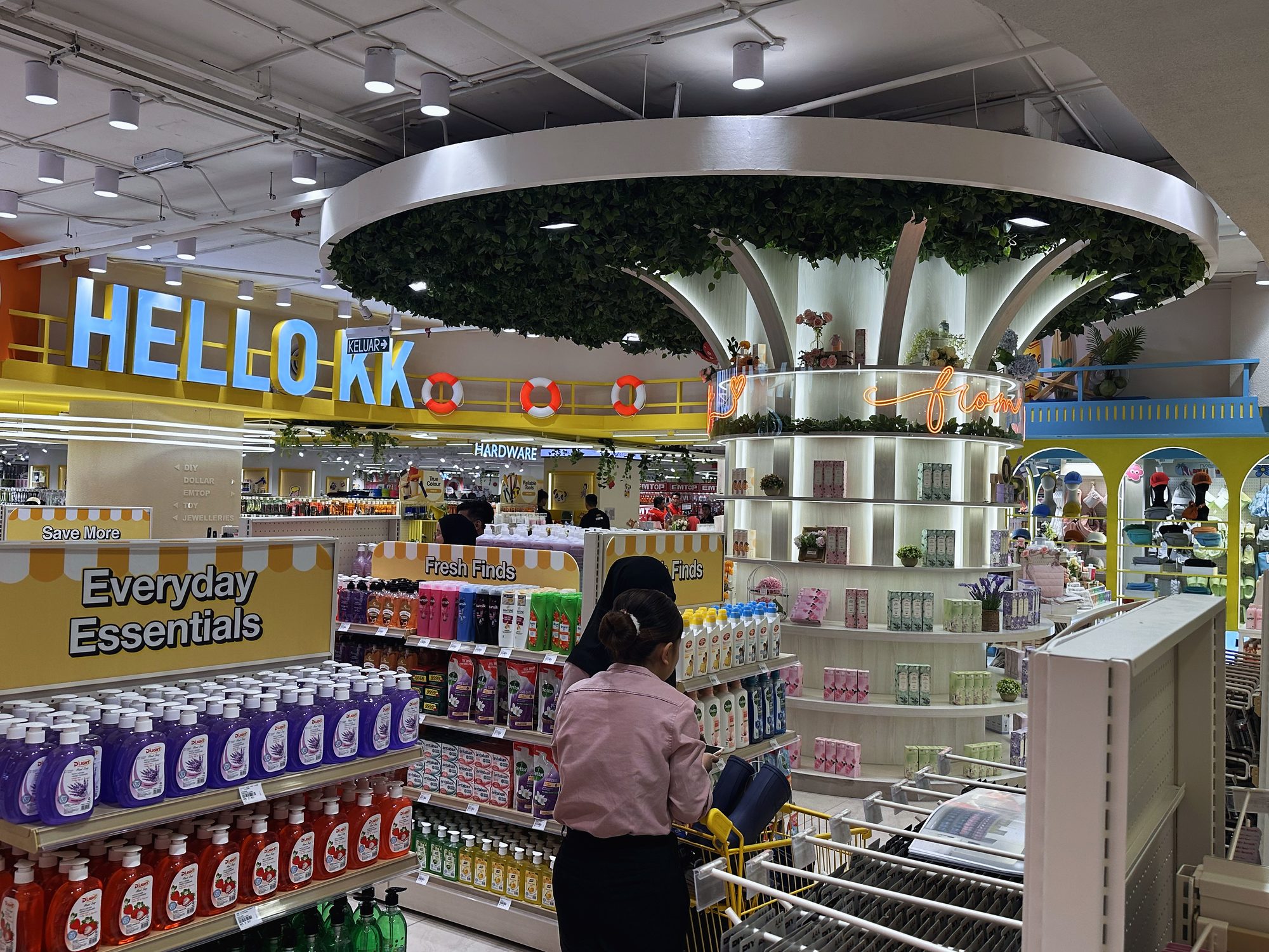 Circular greenery ceiling feature over the beauty zone at MR D.I.Y Plus Imago